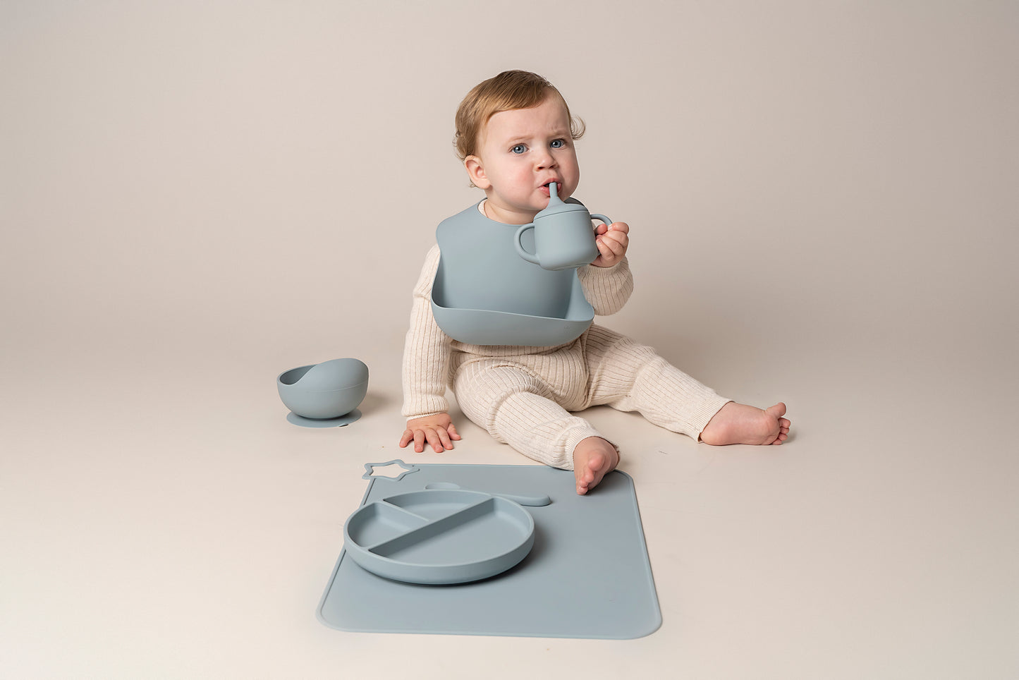 A stylish weaning set for babies and toddlers featuring unbreakable, easy-grip children’s tableware made from premium non-toxic, BPA-free, food-grade silicone. The set includes a strong suction base plate and bowl to prevent spills and distractions during meals. It's also waterproof, microwave, and dishwasher safe, offering convenience and easy cleaning. Whether introducing solids or promoting self-feeding, this baby and toddler weaning set is an essential.