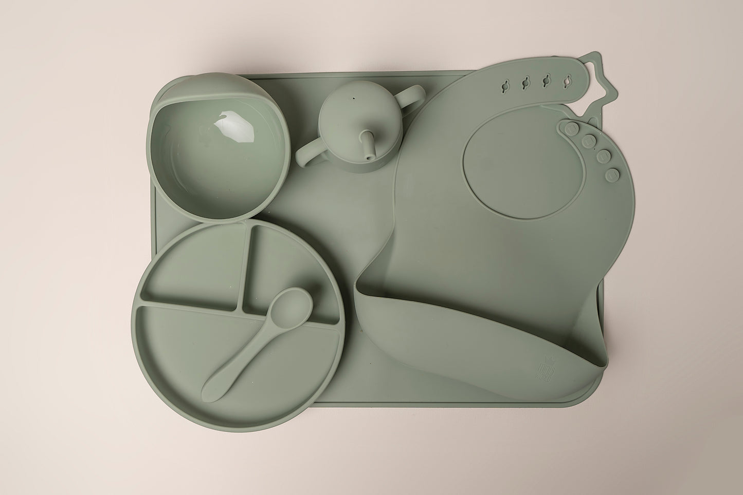 A stylish weaning set for babies and toddlers featuring unbreakable, easy-grip children’s tableware made from premium non-toxic, BPA-free, food-grade silicone. The set includes a strong suction base plate and bowl to prevent spills and distractions during meals. It's also waterproof, microwave, and dishwasher safe, offering convenience and easy cleaning. Whether introducing solids or promoting self-feeding, this baby and toddler weaning set is an essential.