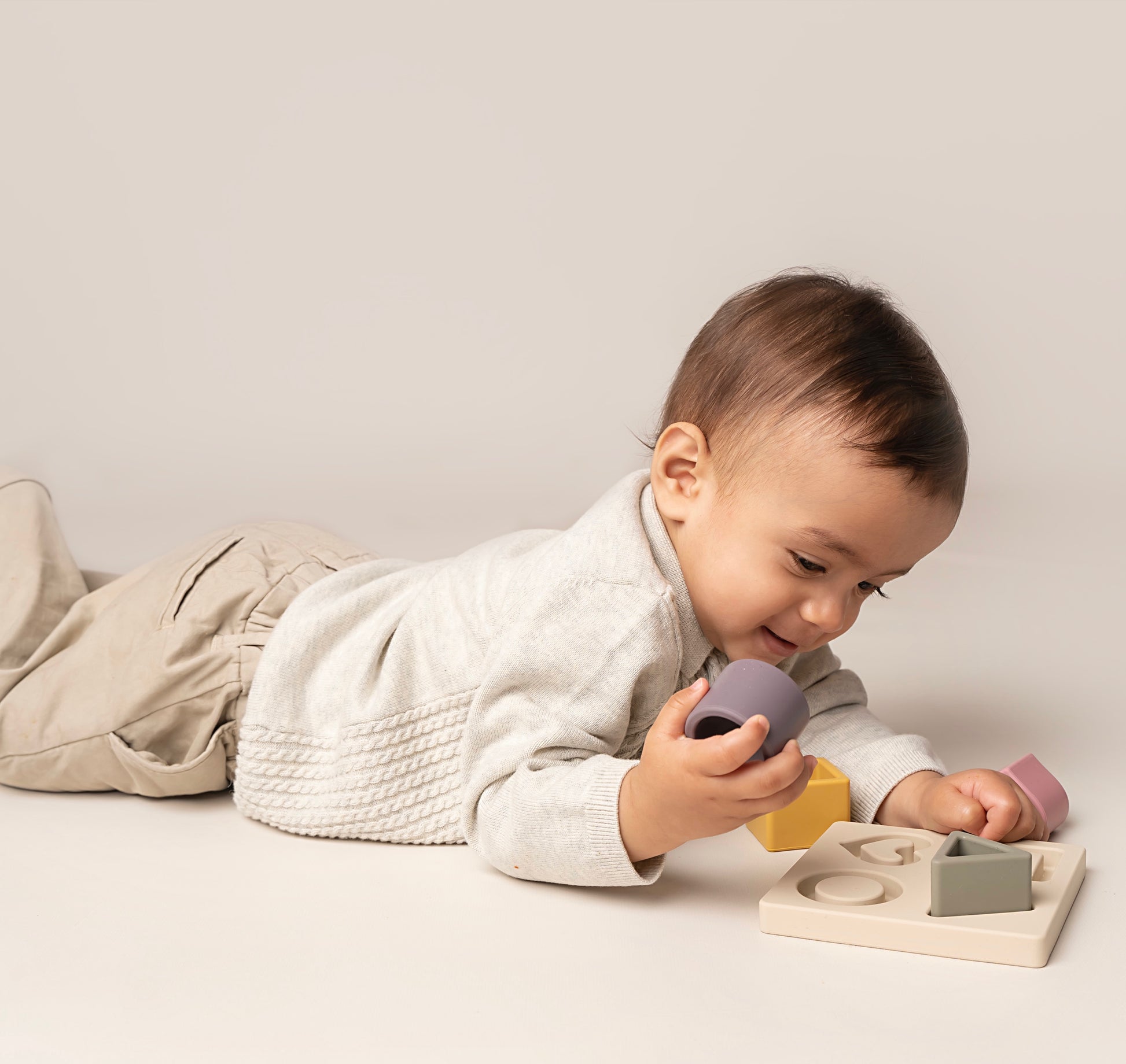 Our First Shapes Puzzle designed for little hands and curious minds. It includes chunky, easy-to-grasp pieces made from non-toxic, food-grade silicone. This puzzle encourages motor skills development, hand-eye coordination, problem-solving, and early understanding of shapes, sizes, and spatial concepts. An ideal toddler gift for fun learning. Available in 2 color options.