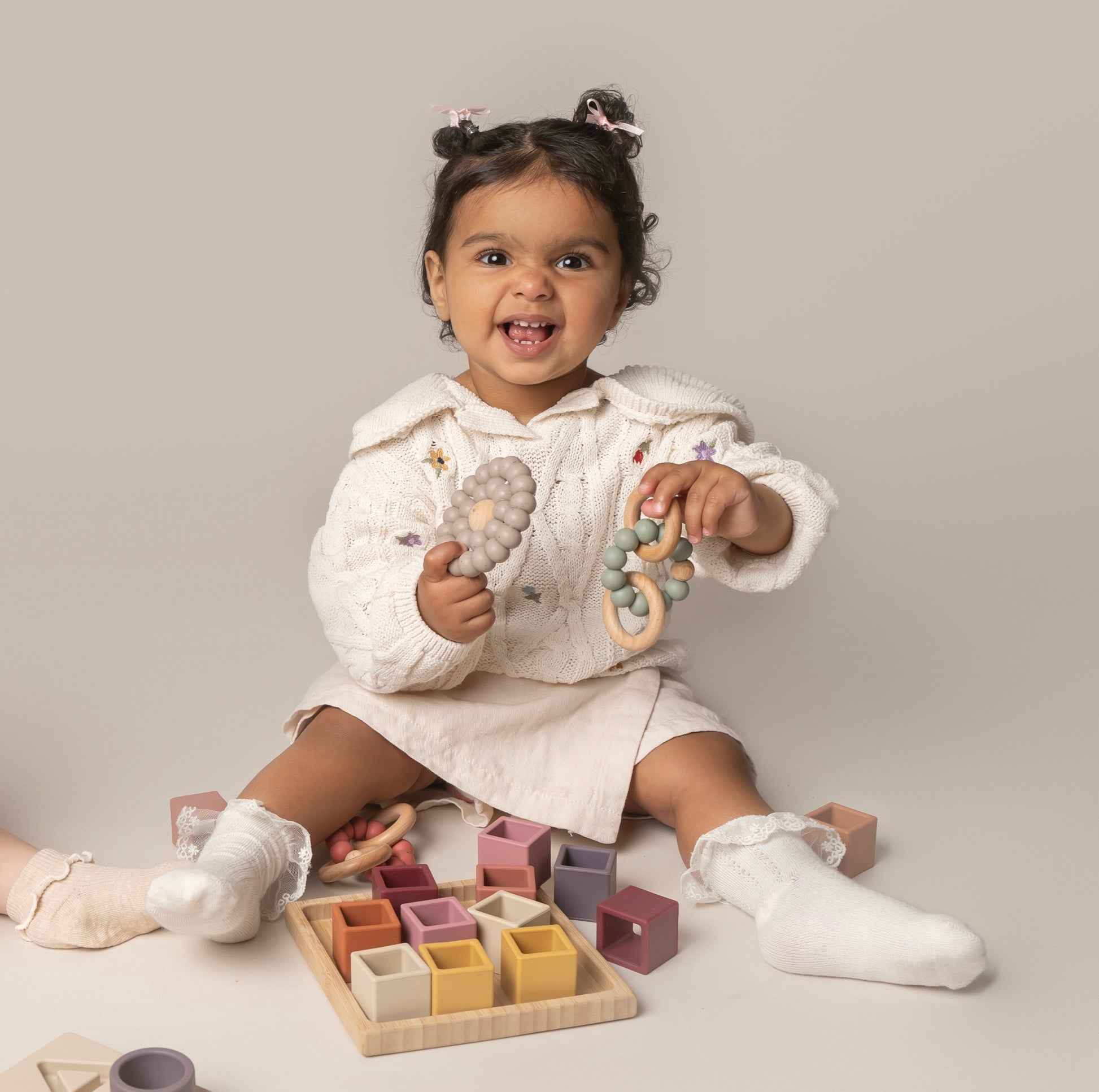 Sort & Stack Blocks for babies and toddlers, designed to spark creativity and learning. These blocks offer colour sorting, stacking, fine motor skill development, and hand-eye coordination. Easy-to-grasp for independent play and exploration. Made from food-grade silicone with a natural wood holder, these blocks are easy to clean, durable, and free from harmful chemicals, safe for teething babies. A playtime essential for every Mini!
